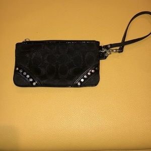 Coach wristlet- studded monochrome
